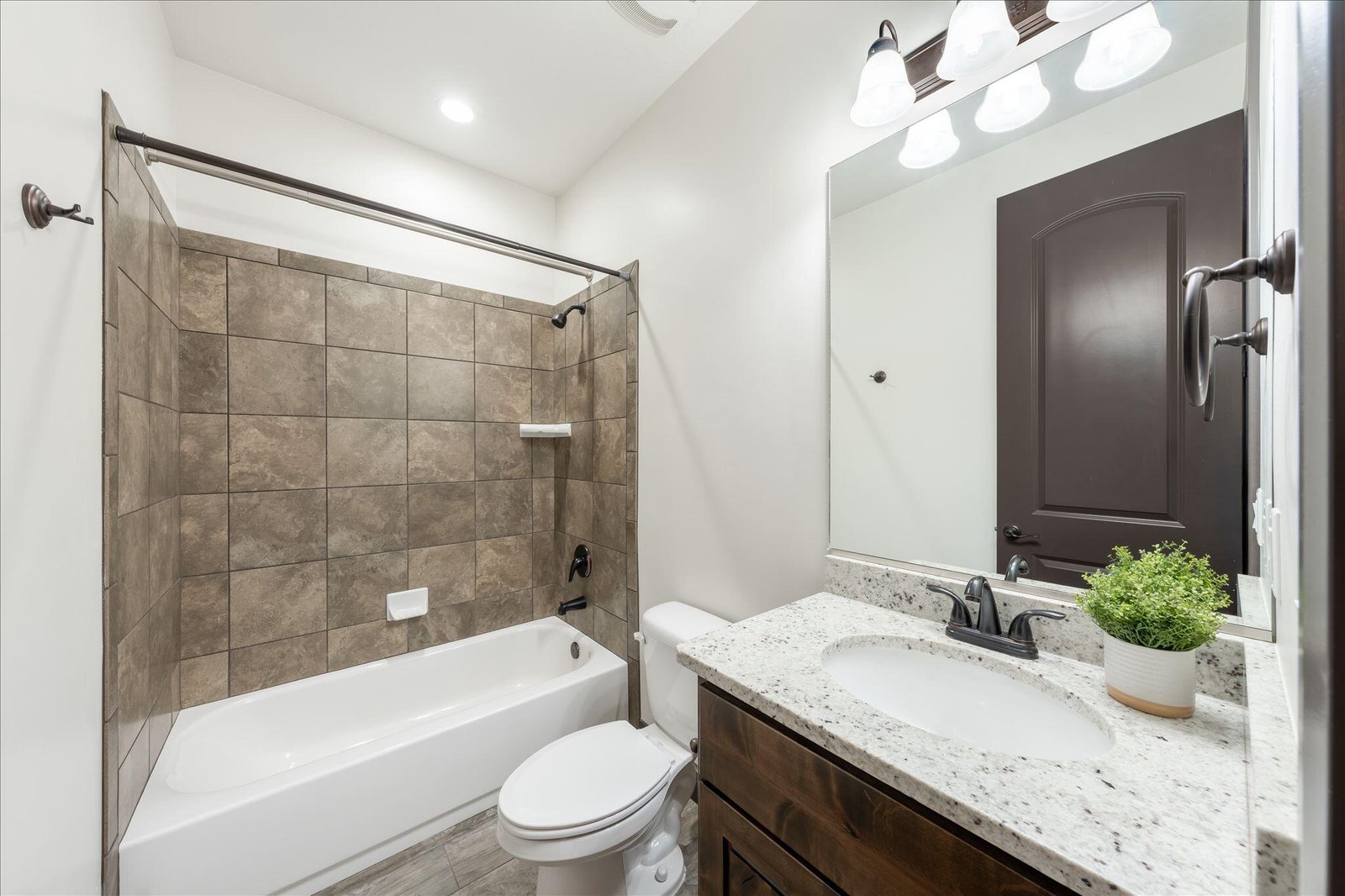 Full bathroom with tile finishes — 313 W Peridot Dr, Washington, UT 84780